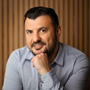 Headshot of Daniel Donici, smiling and thoughtful. - International Awards