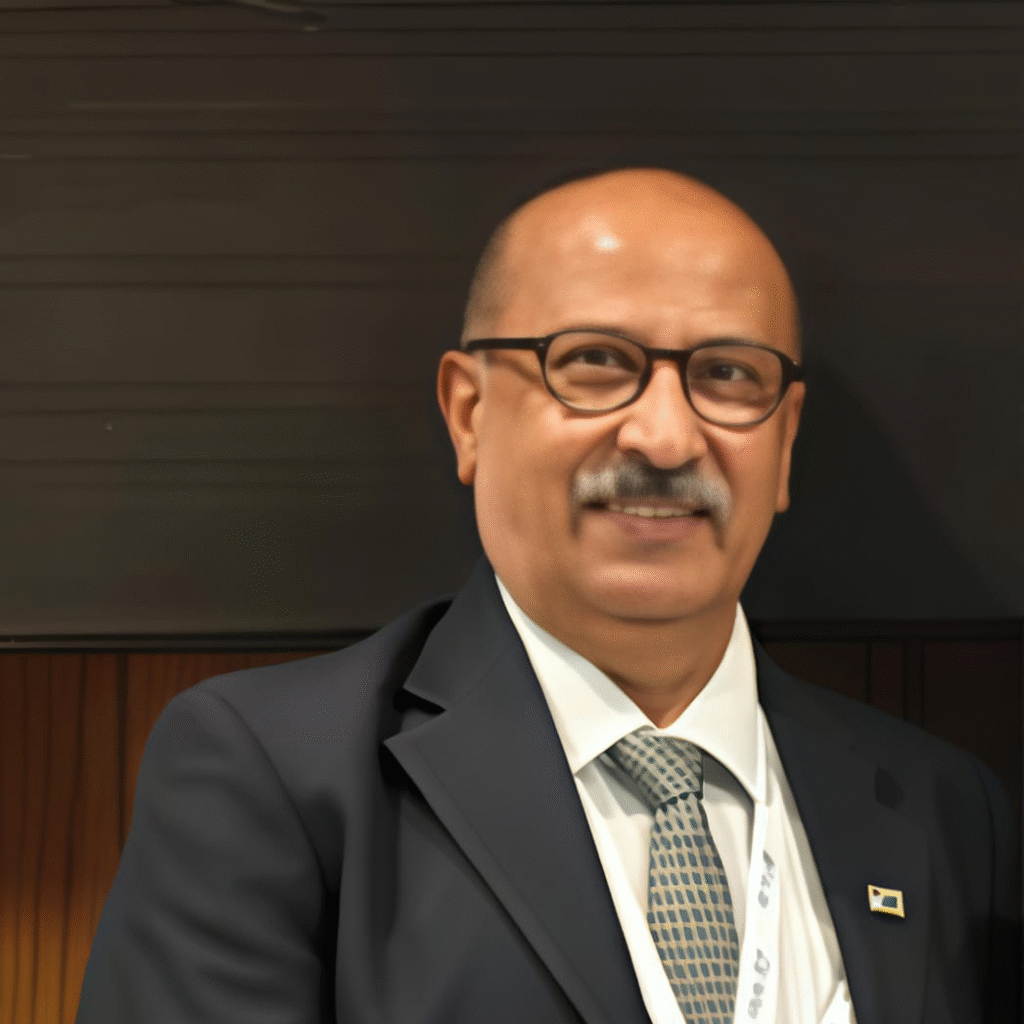 G. Jeevan Raosahib in a business suit and glasses - International Awards