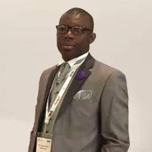 Richmond Kofi Adjapong in a grey suit - International Awards