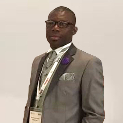 Richmond Kofi Adjapong in a grey suit - International Awards